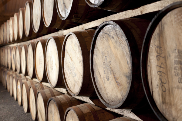 Barrels of Scotch in a warehouse
