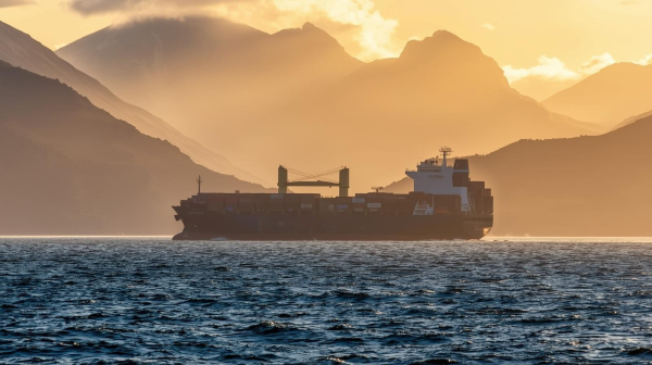 Cargo ship sailing across the ocean