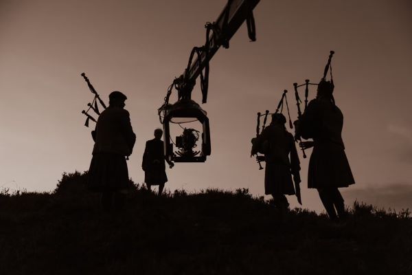 Bagpipers, piping on the hill
